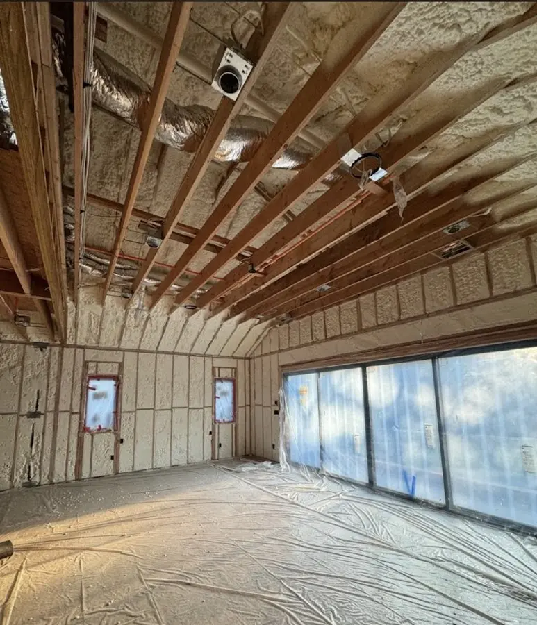 Interior walls and ceiling insulated with spray foam during new construction in Summit Park